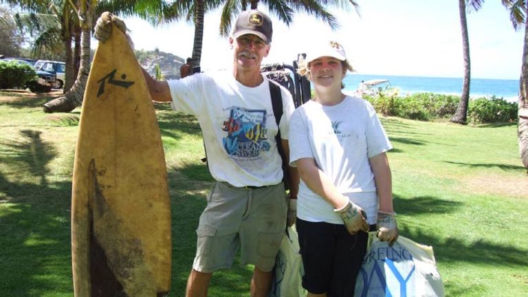 Hotels invite guests to protect the environment during beach clean-up days. // © 2014 Grand Hyatt Kauai