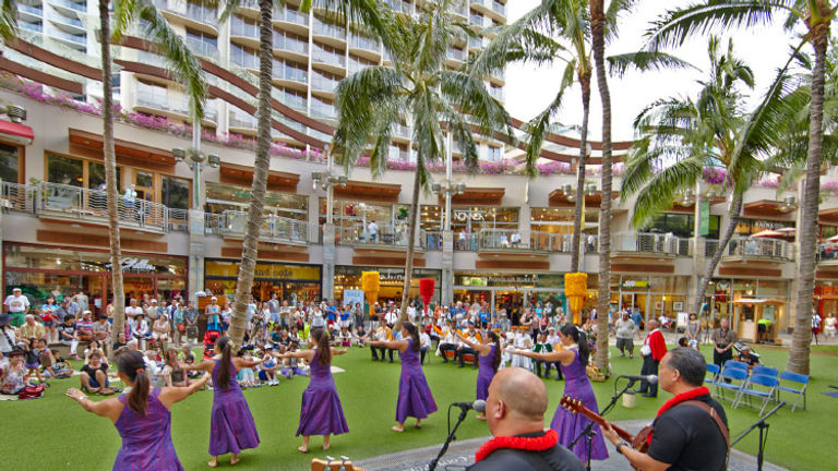 Visitors and locals enjoy live island performances at Waikiki Beach Walk, a symbol of Outrigger’s dedication to the destination and its culture. // © 2017 Outrigger Hotels and Resorts