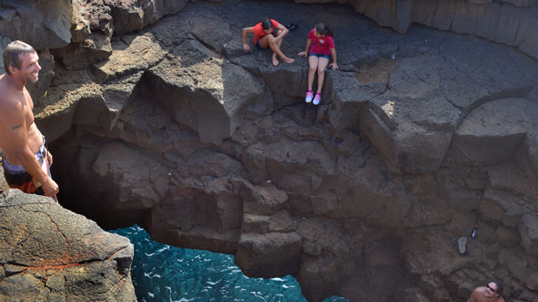 Adventurous folks at Ka Lae, the southern most point of the U.S. // (c) 2013 Mindy Poder
