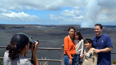 Ranger Shyla Ronia takes family photos at Hawaii Volcanoes National Park's Halemaumau Crater. // (c) 2012 Mindy Poder