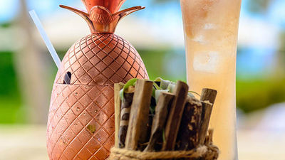 Hotels all across Hawaii are touting house-made signature cocktails, such as the Pineapple Elyx-ir from Four Seasons resort Oahu at Ko Olina. // © 2017 Four Seasons Resort Oahu at Ko Olina