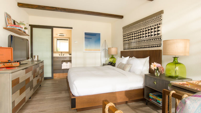 Courtyard Premiere rooms are on the ground floor and feature hardwood floors, patios and record players. // © 2015 John Ellis