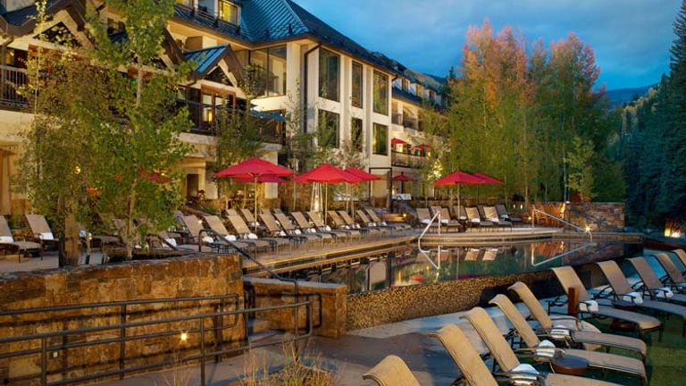 The heated infinity pool that overlooks Gore Creek is a perennial guest favorite at Vail Cascade Resort & Spa. // © 2014 Destination Hotels & Resorts