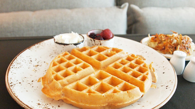 The Belgian waffle with Pudwill Farms berry compote and maple mascarpone from Della’s Kitchen is a breakfast must. // © 2014 Robin Rockey