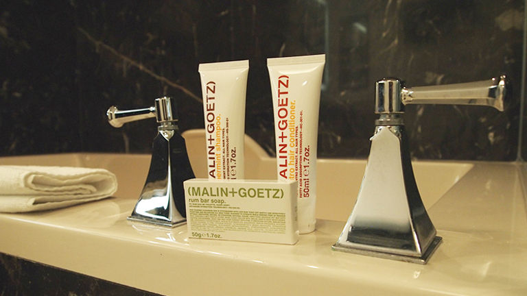 Malin + Goetz toiletries, along with super soft white robes and slippers, bring a touch of powder-room luxury to Delano Las Vegas. // © 2014 Robin Rockey