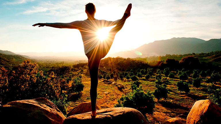 Outdoor yoga at Ojai Valley Inn & Spa combines physical fitness and meditation with stunning views of the Topatopa Mountain range. // © 2014 Ojai Valley Inn & Spa