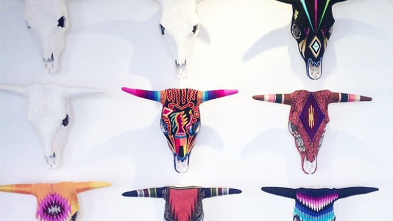 Evoke the Spirit’s collection of yarn-painted skulls is handcrafted by Huichol tribespeople in Nayarit // © 2015 Evoke the Spirit