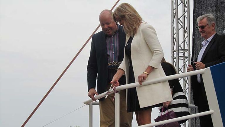 Kristin Karst, the godmother of AmaKristina, cut a ribbon that sent a bottle of champagne crashing into the ship’s hull. // © 2016 Elizabeth Dupuis