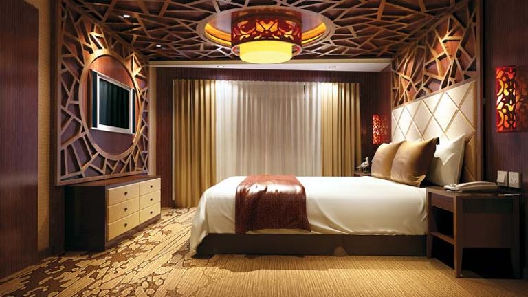 Regional decor and large wraparound balconies are among the highlights of the two Presidential Suites onboard Century Paragon, which sails on the Yangtze River. // © 2014 Uniworld Boutique River Cruises