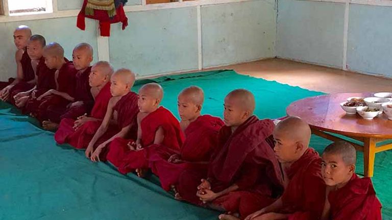 Young monks in training greet our group. // © 2016 Kenneth Shapiro