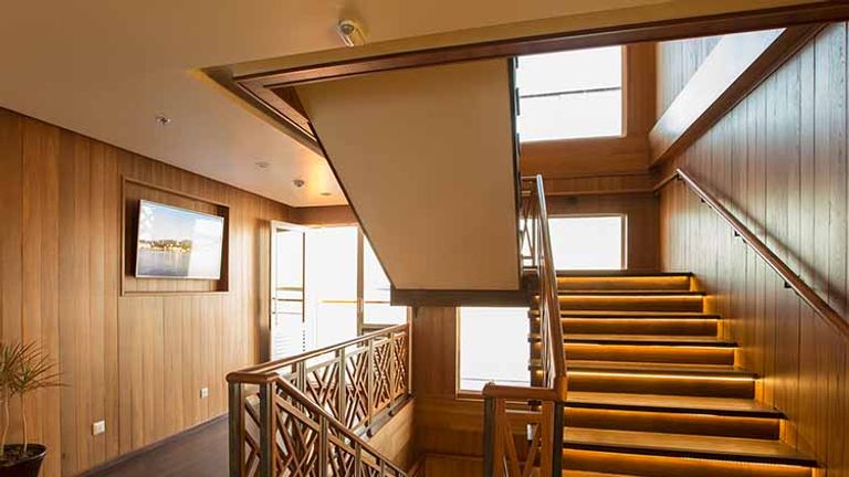Wood accents are used throughout Avalon Myanmar. // © 2016 Avalon Waterways