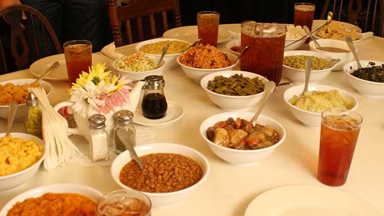 Classic Southern dishes such as collard greens, fried chicken and macaroni and cheese are served family style at Mrs. Wilkes. // © 2014 Nila Do Simon F2