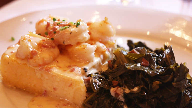 The shrimp and grits at The Olde Pink House has been voted as the city’s best by local diners. // © 2014 Nila Do Simon