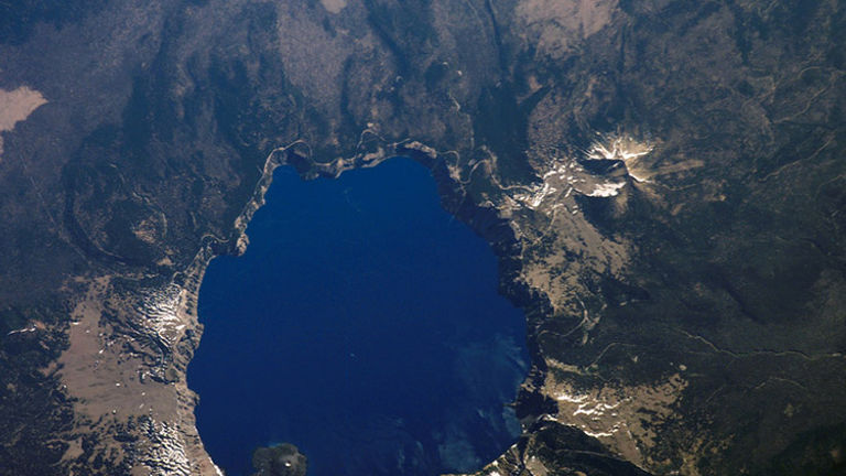Shown in this shot from above captured by NASA, Crater Lake National Park is Oregon’s only national park. // © 2016 Creative Commons user nasamarshall