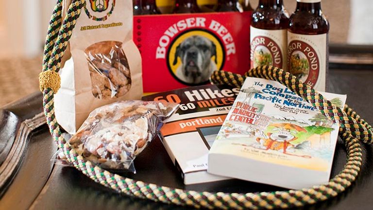 Guests at the Kimpton hotel can treat their pets to a gift basket with dog beers, treats and maps featuring pet-friendly hiking trails. // © 2017 Kimpton Hotel Monaco Portland