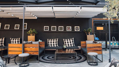 A patio area offers guests the chance to work outside, unwind with a cocktail from on-site restaurant Tart or relax after a dip in the pool.