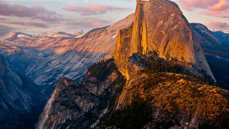 Yosemite National Park is home to a diverse wealth of nature, from waterfalls and lakes to the famous Half Dome, which stands at almost 5,000 feet tall. // © 2016 iStock