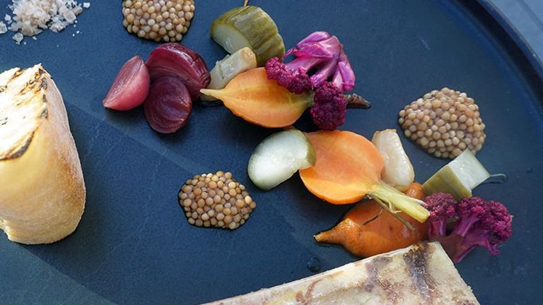 Spire 73’s Roasted Bone Marrow pairs excellently with crusty bread and pickled vegetables. // © 2017 Valerie Chen