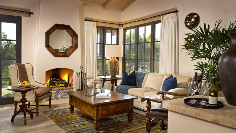 The 1,000-square-foot guestrooms include a living room, complete with a fireplace and ample seating.