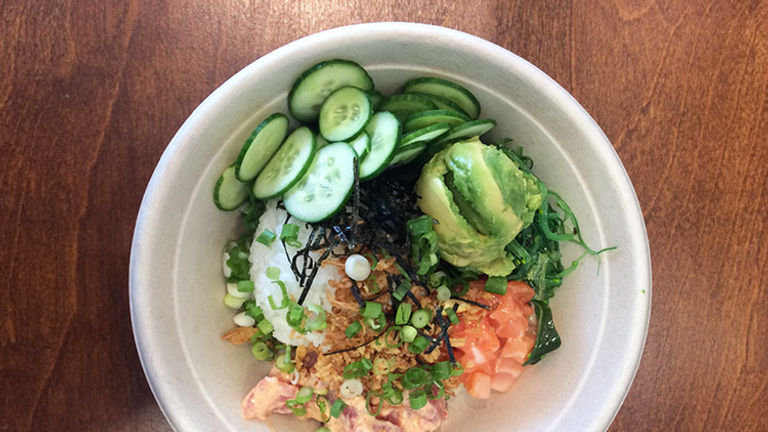 At Sea Salt Poke, order generous portions of protein of poke-style fish, with toppings such as crispy onions, cucumbers, avocado, green onions, edamame and more. // © 2016 Emma Weissmann
