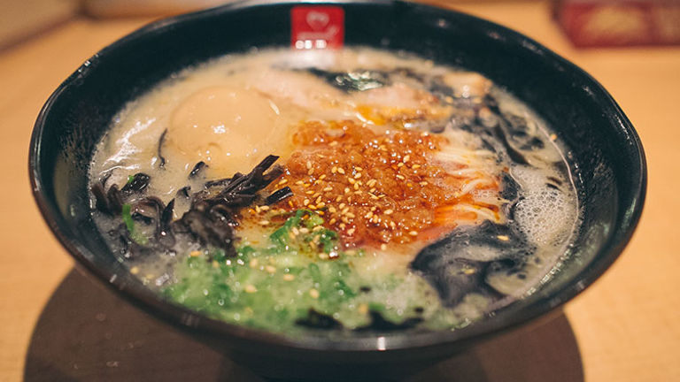 Enjoy ramen noodles swimming in a tonkotsu (pork bone) broth at Tatsu Ramen. // © 2016 Creative Commons user daremoshiranai