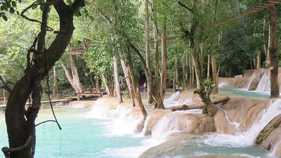Laos' many unspoiled natural wonders, including Tad Xe Falls, makes it a terrific destination for adventure travelers. // © 2017 Boundless Journeys