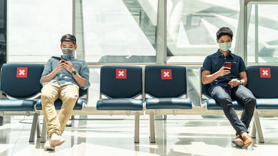 Travelers should wear double masks while traveling, assure that one is traveling with an airline that does all it can to respect social distance regulations, and minimize time spent in crowds while at the airport, suggests Dr. Edwards.