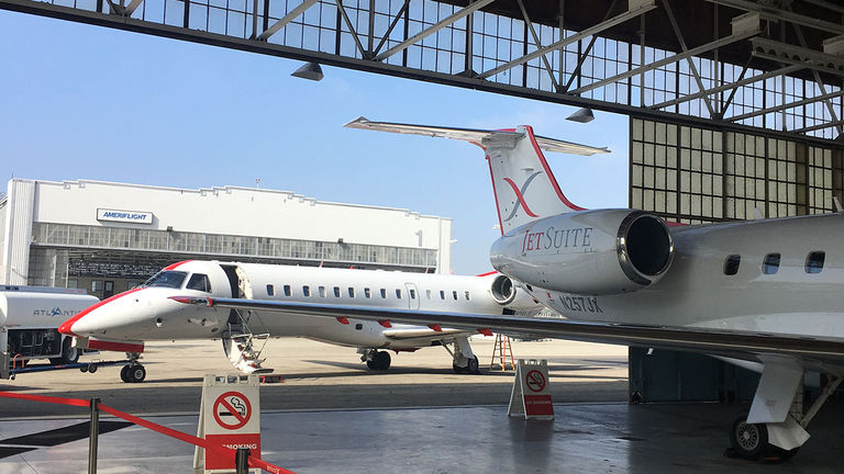 At Hollywood Burbank Airport, passengers wait to board their flight in a private hangar.