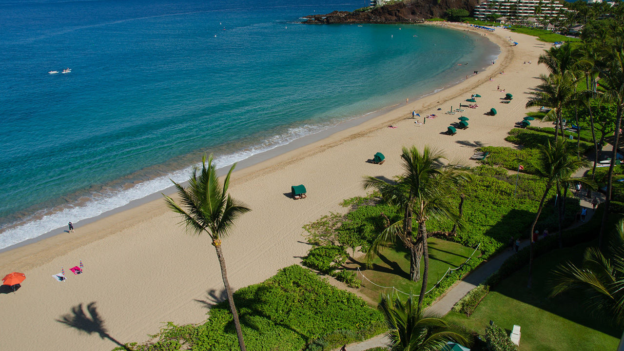 Kaanapali's long stretches of white-sand beaches and significant landmarks like Black Rock create an alluring natural setting for a Maui vacation.