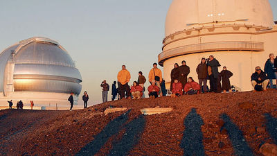 Watching the sunset from the top of Mauna Kea is one of Hawaii's distinctive bucket list activities. // © 2015 Hawaii Forest and Trail
