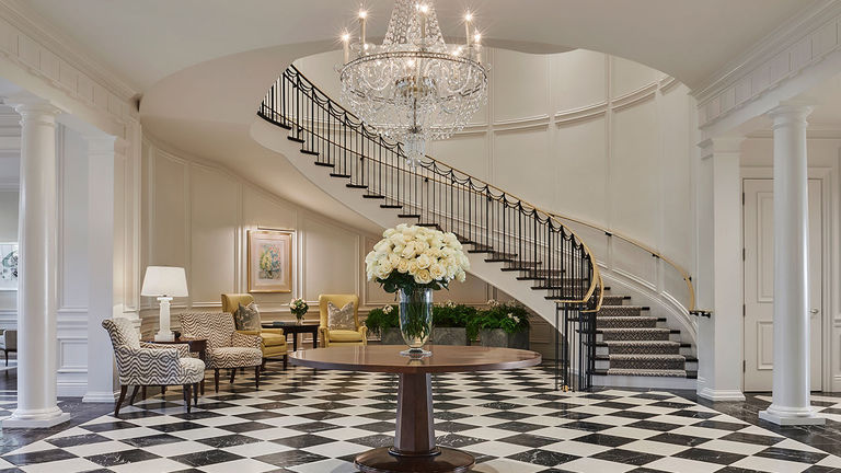 The grand staircase in the property’s Manor House is based on a Paul Williams design.
