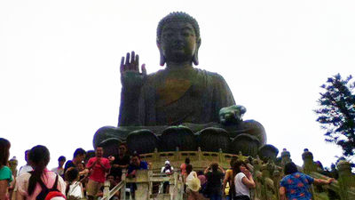 Tian Tan Buddha towers over the landscape.