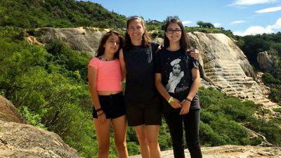 The writer (far right) with her sister (left) and mother (middle) // © 2017 Regina Ortiz