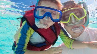 Fathers and sons can bond while exploring Hawaii’s oceanic wonders. // © 2014 Thinkstock/shalamov 2