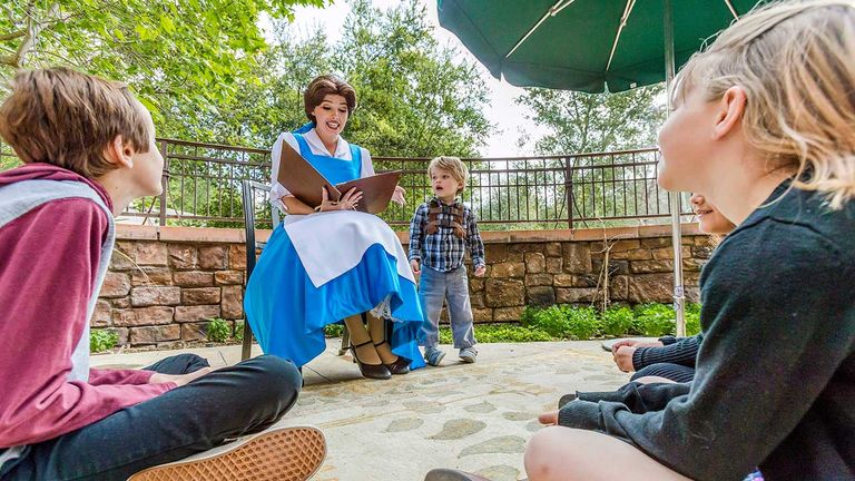 After brunch, kids can read a story with Belle.