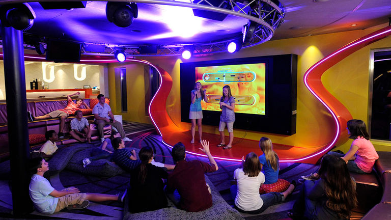 A media room serves as the central gathering space in Vibe, a club onboard Disney Cruise Line vessels that was created exclusively for guests ages 14 to 17.