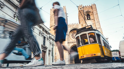 Explore popular spots like Lisbon, Portugal, while taking part in community-involvement activities with luxury family travel provider Global CommUnity.