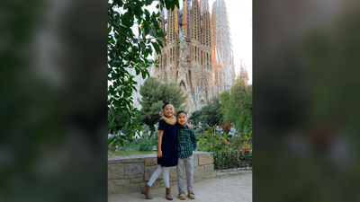 Melia (left) and her brother in Spain.