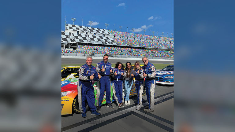 Guests get to drive a real NASCAR stock car around the Daytona track.