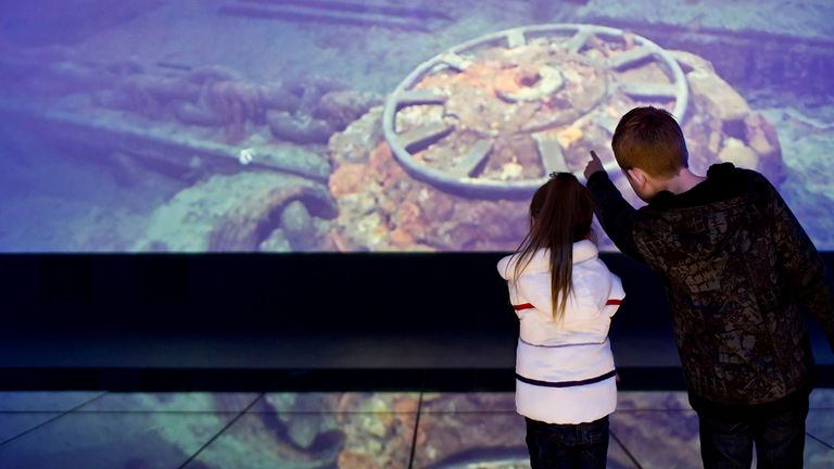Visitors to Titanic Belfast can learn about the ship’s history.