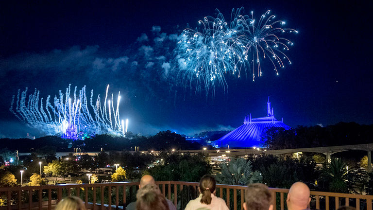 The private patio at Disney's Contemporary Resort offers a spectacular view of the Happily Ever After fireworks show over the Magic Kingdom.