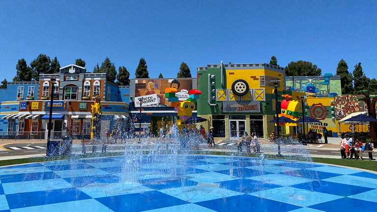 The colorful new land has three new eateries and six new attractions.