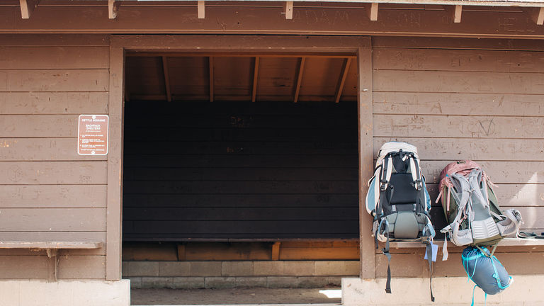 Backcountry huts with outhouses are located along the trail.