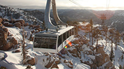 Squaw Valley Ski Resort's aerial tram takes guests to eateries and sights at the resort's High Camp, which sits at 8,200 feet in elevation. // © 2015 Trevor Clark