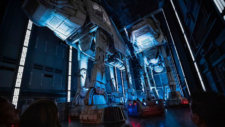 The trackless ride vehicles weave between the legs of massive AT-AT walkers.