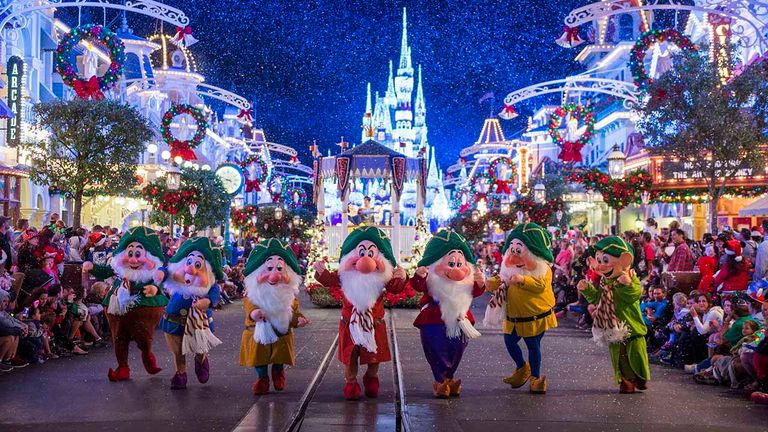The Seven Dwarfs appear in their holiday finest at Mickey’s Very Merry Christmas Party.