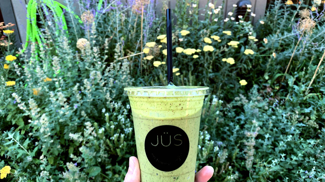 The Kermit smoothie features matcha, banana, spinach, almond butter, spices, coconut milk and more.