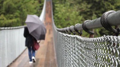 The 460-foot-long Capilano Suspension Bridge soars 230 feet above the Capilano River.