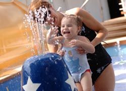 Disney keeps toddlers happy in the splash pool. // © 2011 Disney Cruise Line Disney keeps toddlers happy in the splash pool. // © 2011 Disney Cruise Line
