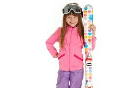 Girl with ski gear // © 2012 Thinkstock